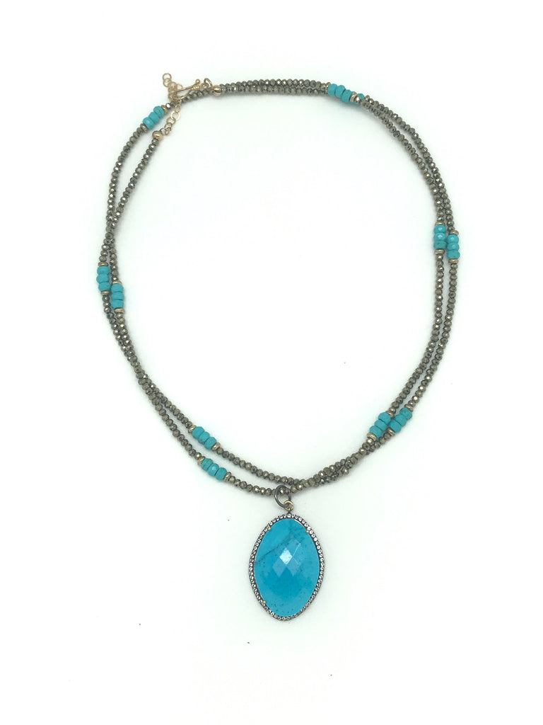 Turquoise Drop On Pyrite